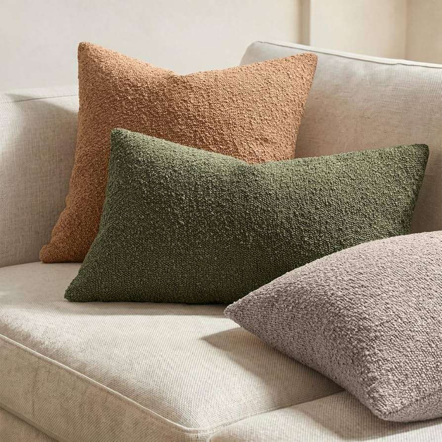 Handcrafted wool and cotton cushions styled on a sofa