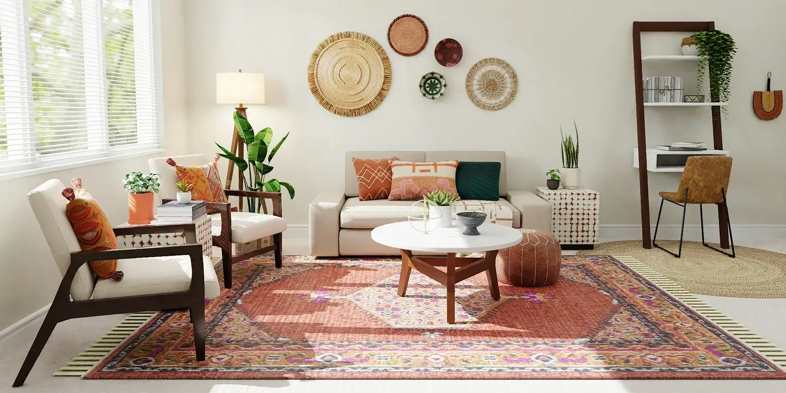 A bright living room with a red patterned rug under a round coffee table and armchairs