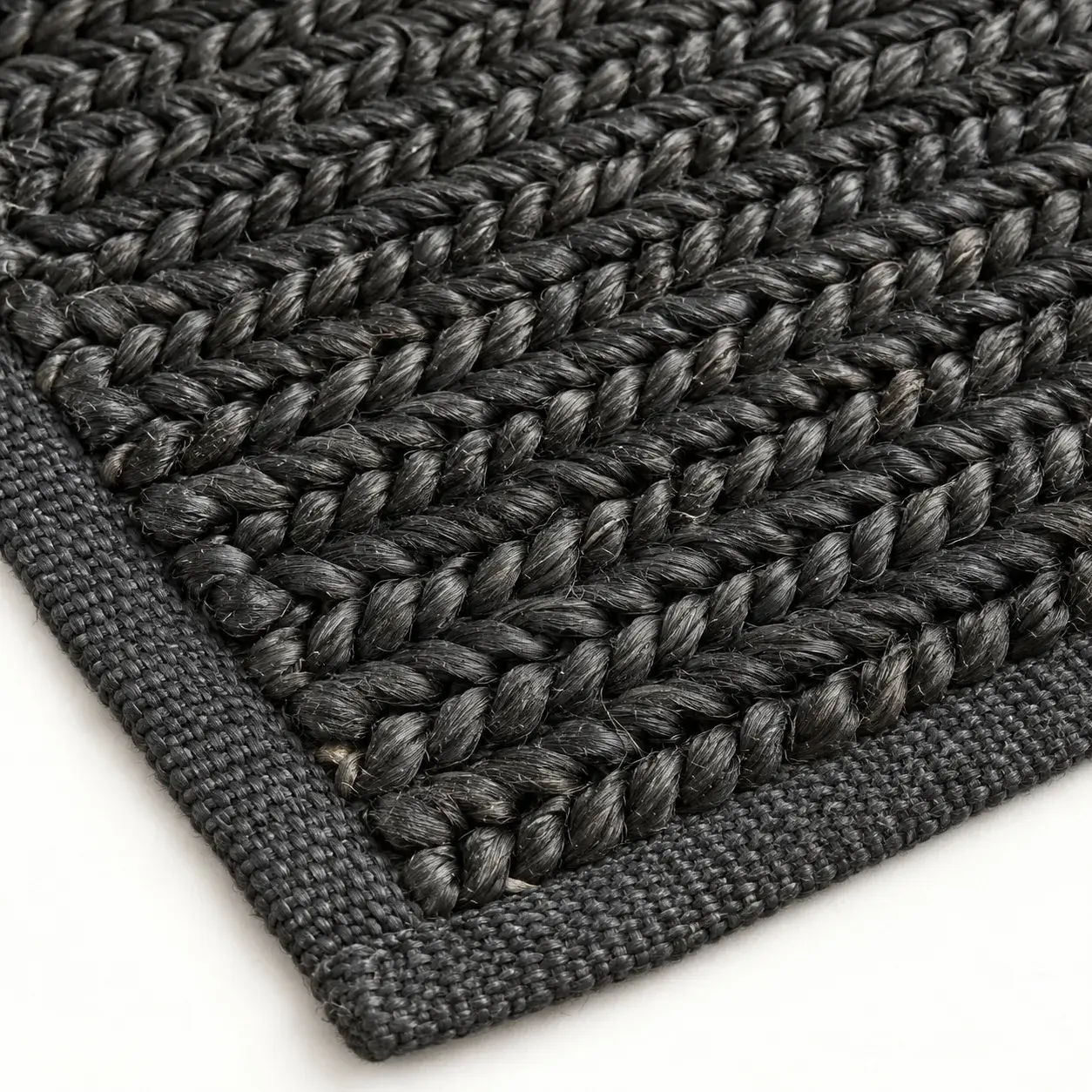 Close view of the Bastia Rug in black showing its texture and detail