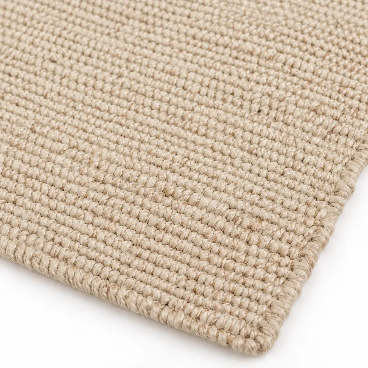 Close view of the Chenille Rug in bleach showing its texture and detail