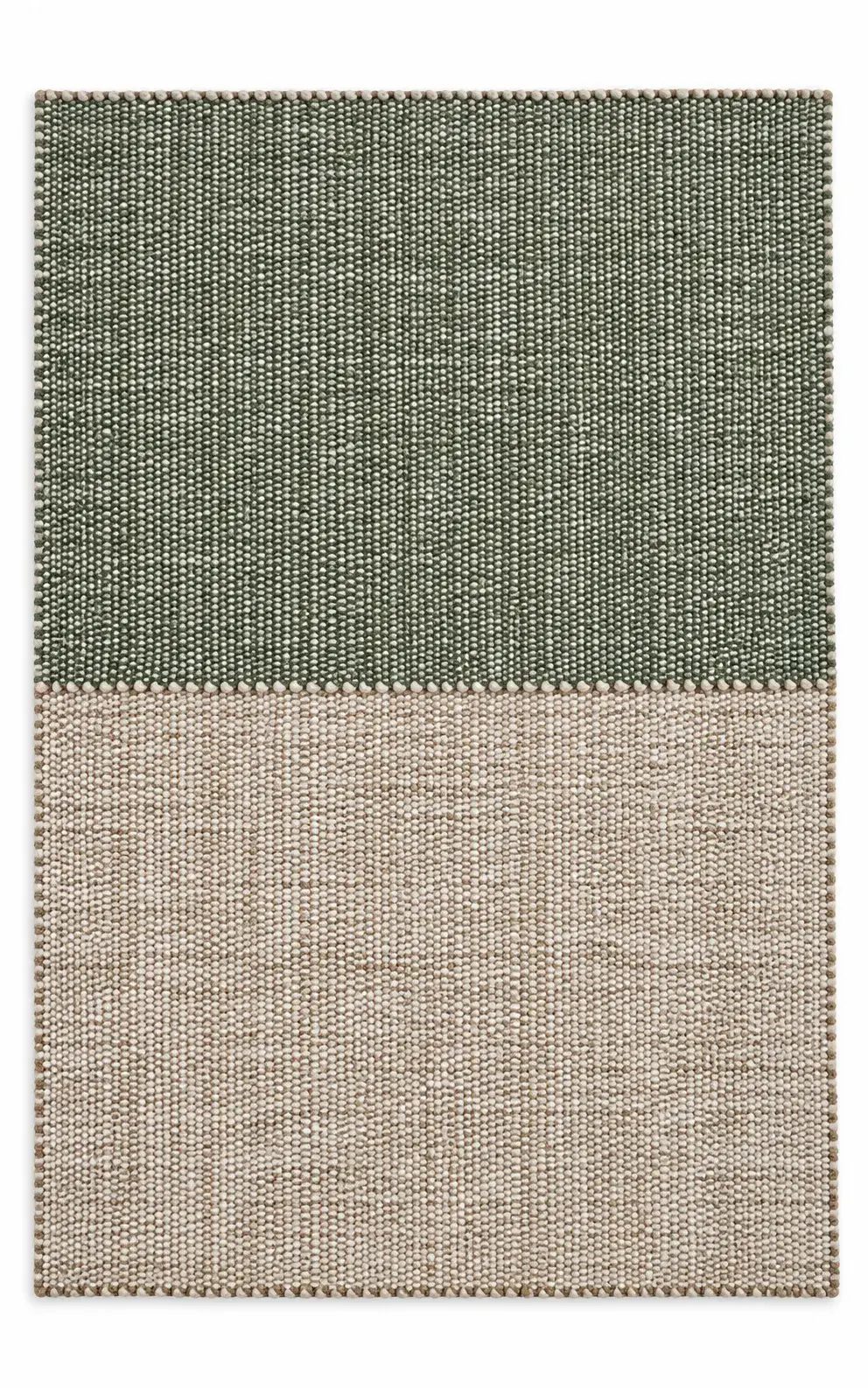 Close view of the Cordelia Rug in natural olive showing its texture and detail
