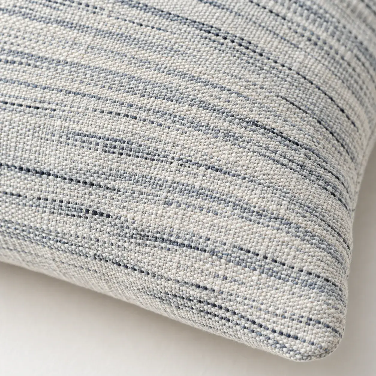 Close view of the Curlew Cushion Cover showing its texture and detail