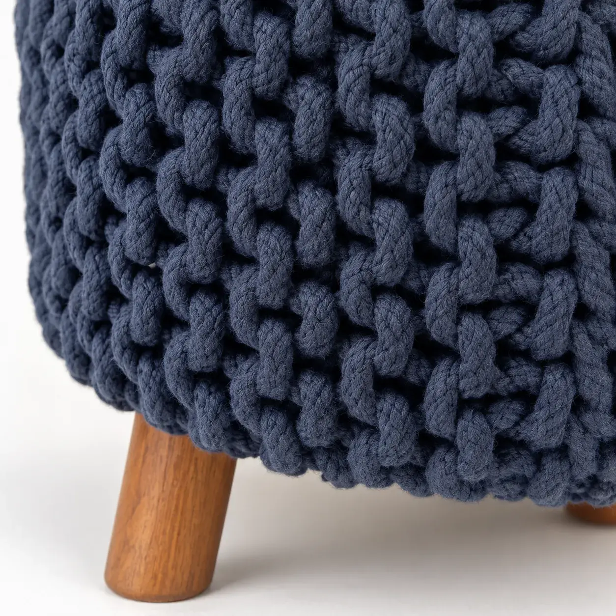 Close view of the Dario Pouf showing its texture and detail