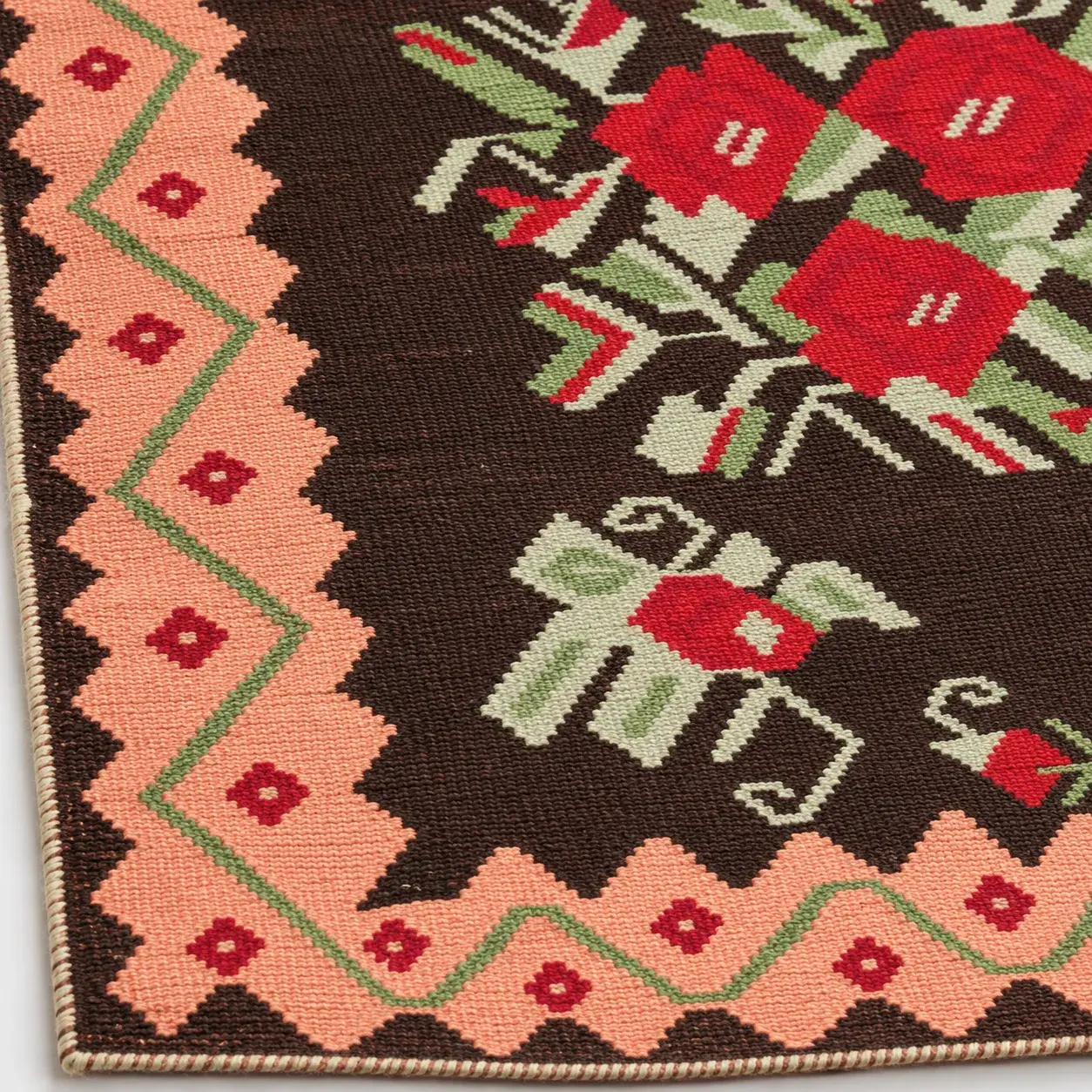 Close view of the Esme Rug in brown showing its texture and detail