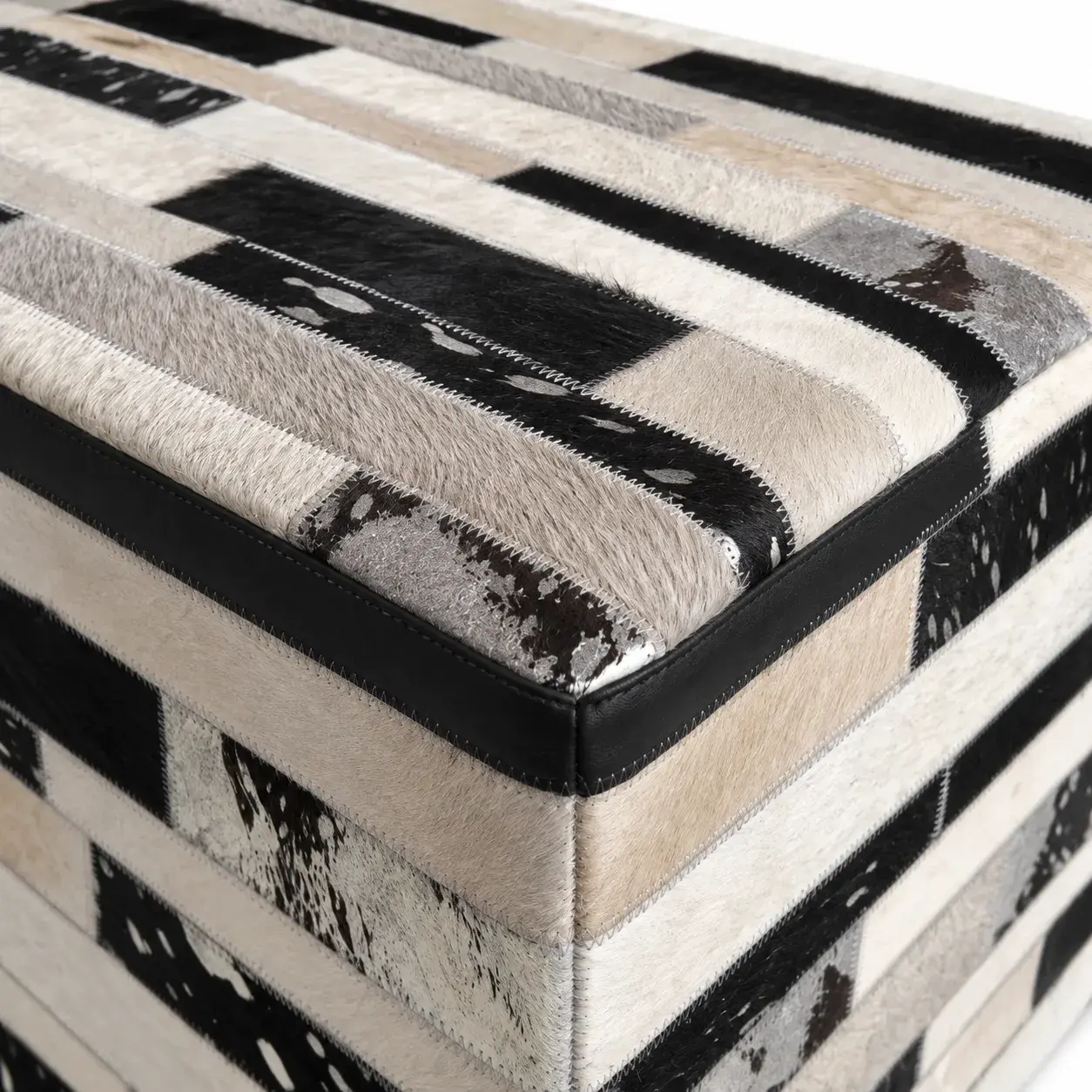 Close view of the Evander Pouf showing its texture and detail