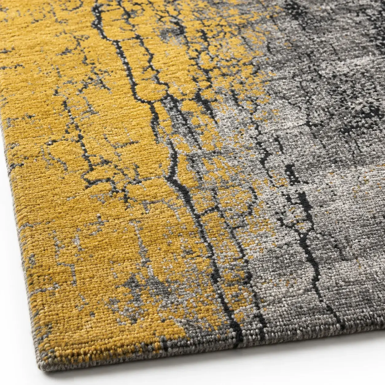 Close view of the Ilario Rug in gold showing its texture and detail