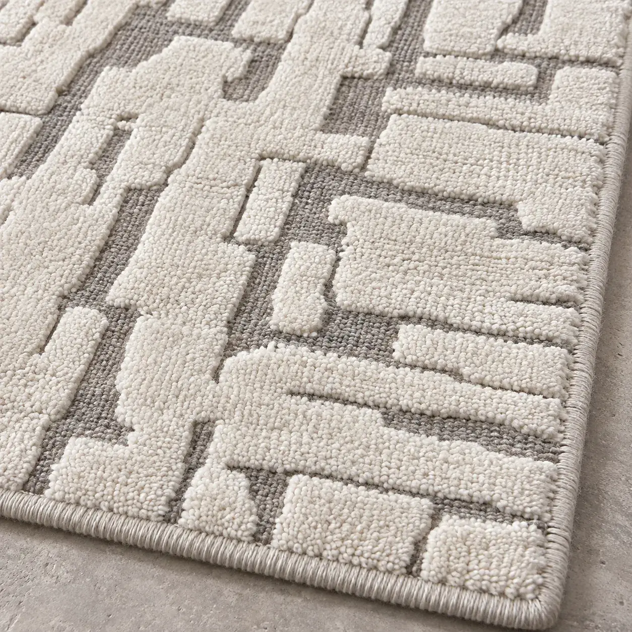 Close view of the Joaquin Rug in silver ivory showing its texture and detail