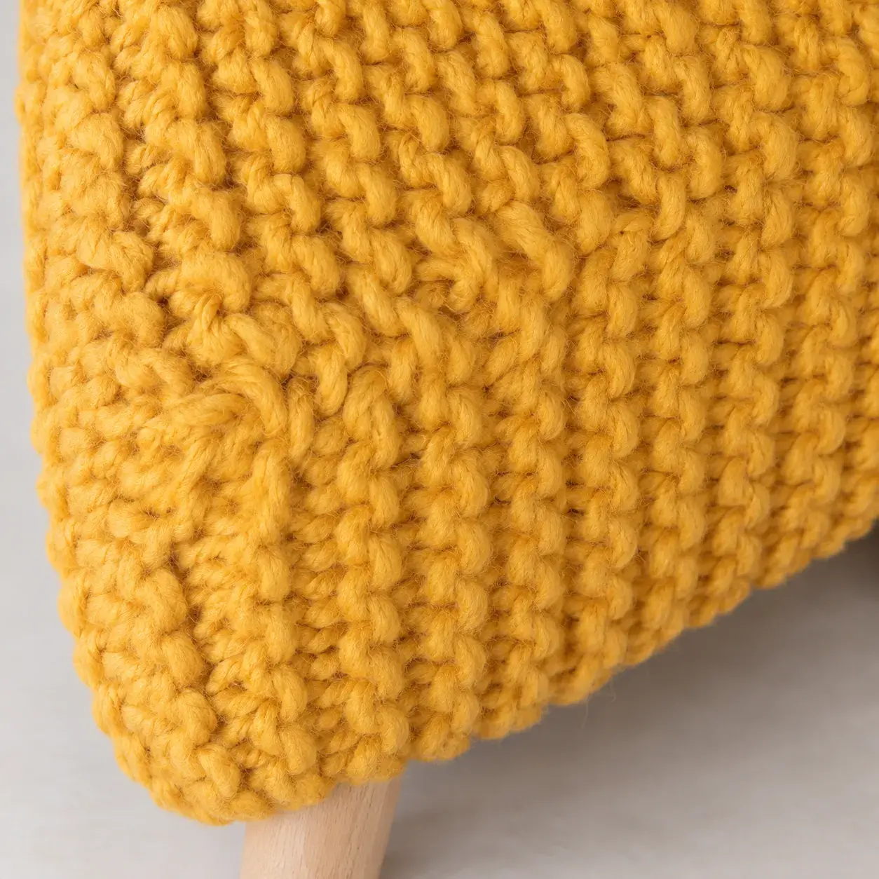 Close view of the Juno Pouf showing its texture and detail