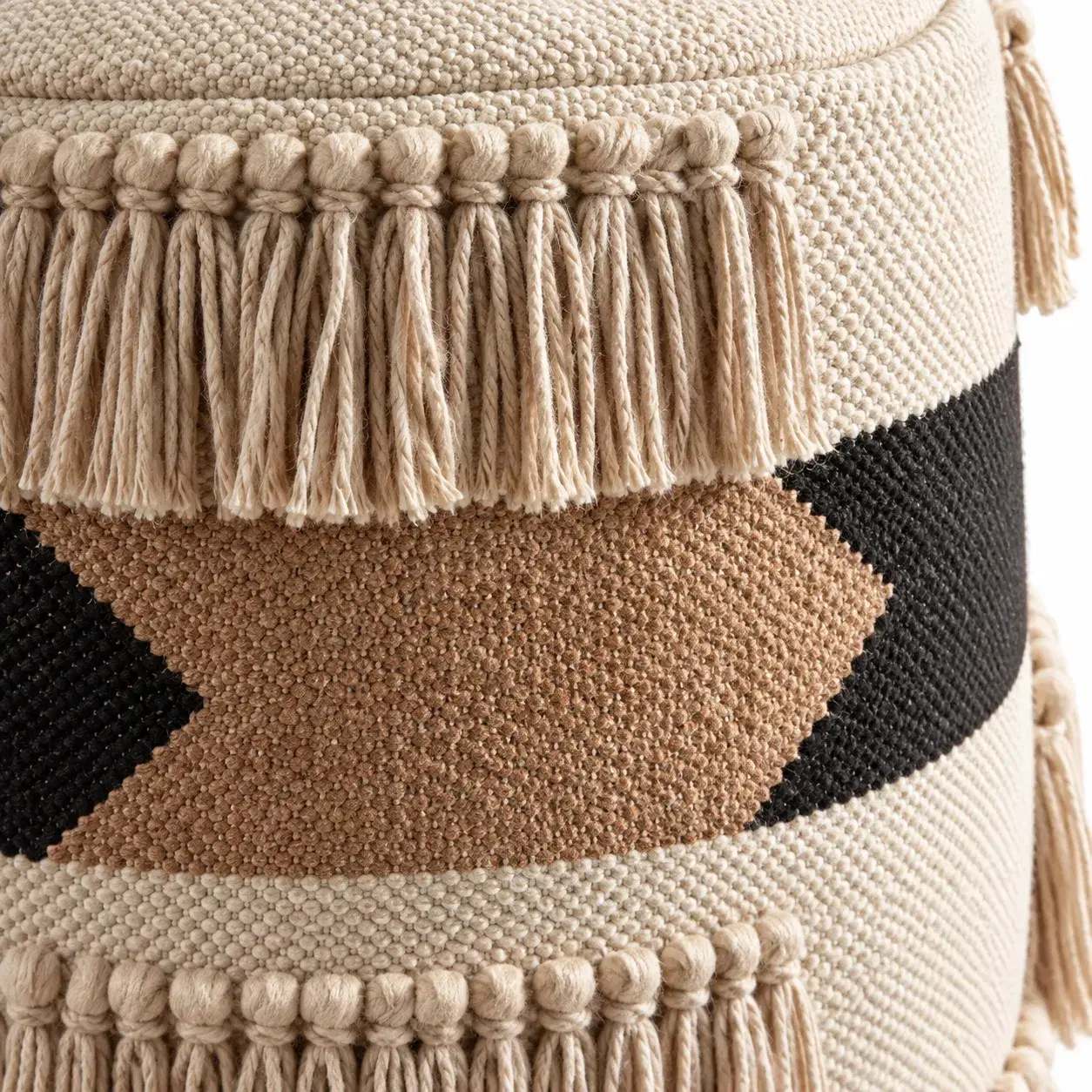 Close view of the Kai Pouf showing its texture and detail