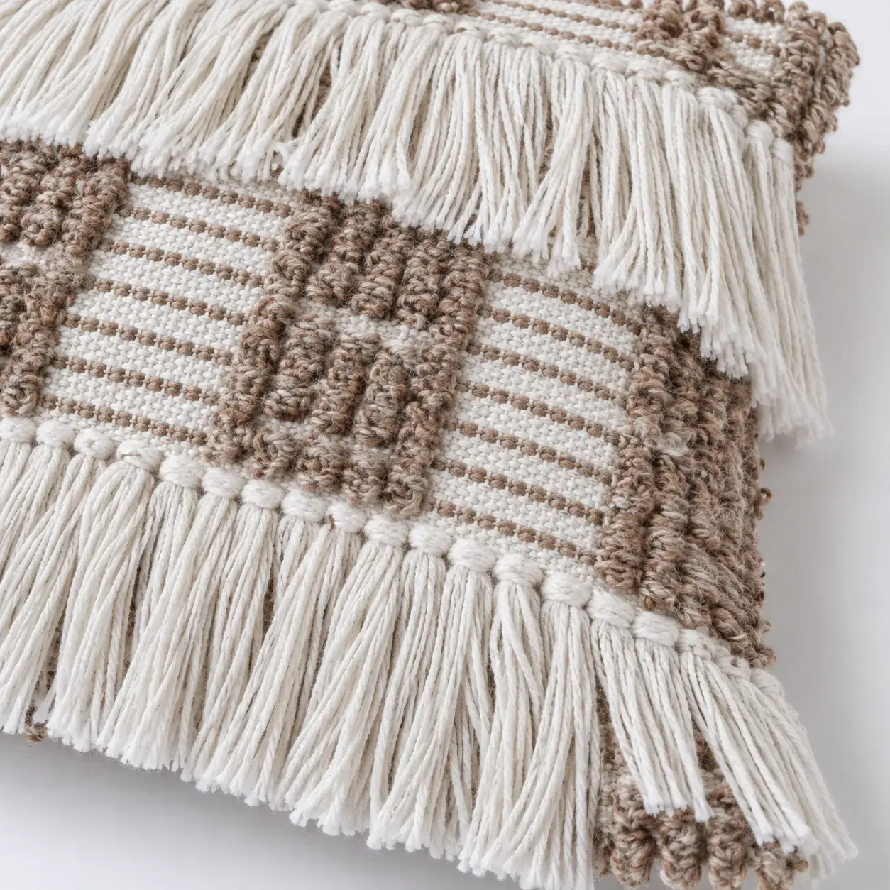 Close view of the Lazlo Cushion Cover showing its texture and detail