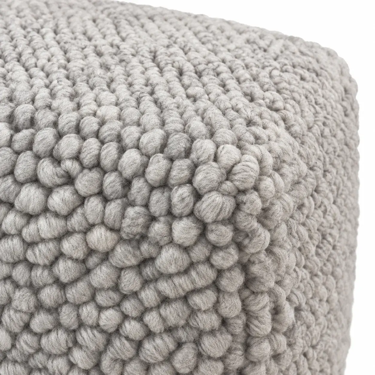 Close view of the Lyra Pouf showing its texture and detail