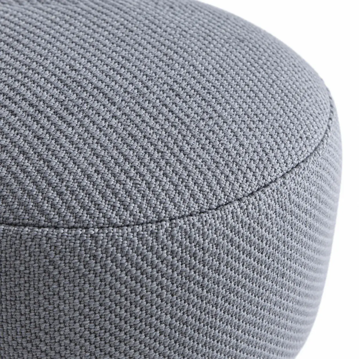 Close view of the Mattis Pouf showing its texture and detail
