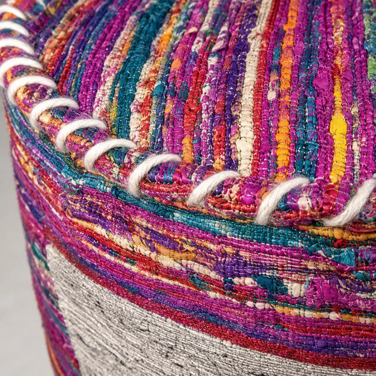 Close view of the Mira Pouf showing its texture and detail