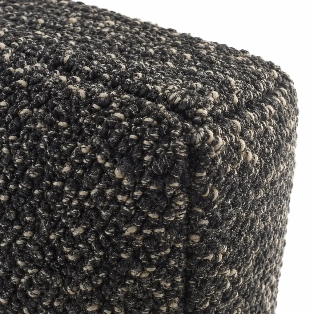 Close view of the Noor Pouf showing its texture and detail