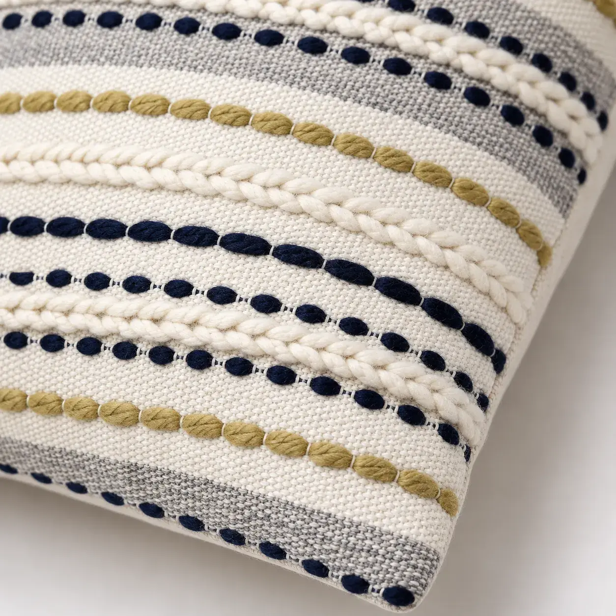Close view of the Olinda Cushion Cover showing its texture and detail