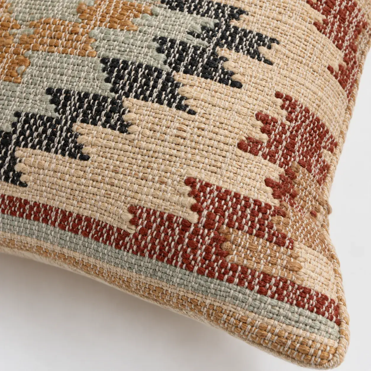 Close view of the Osric Cushion Cover showing its texture and detail
