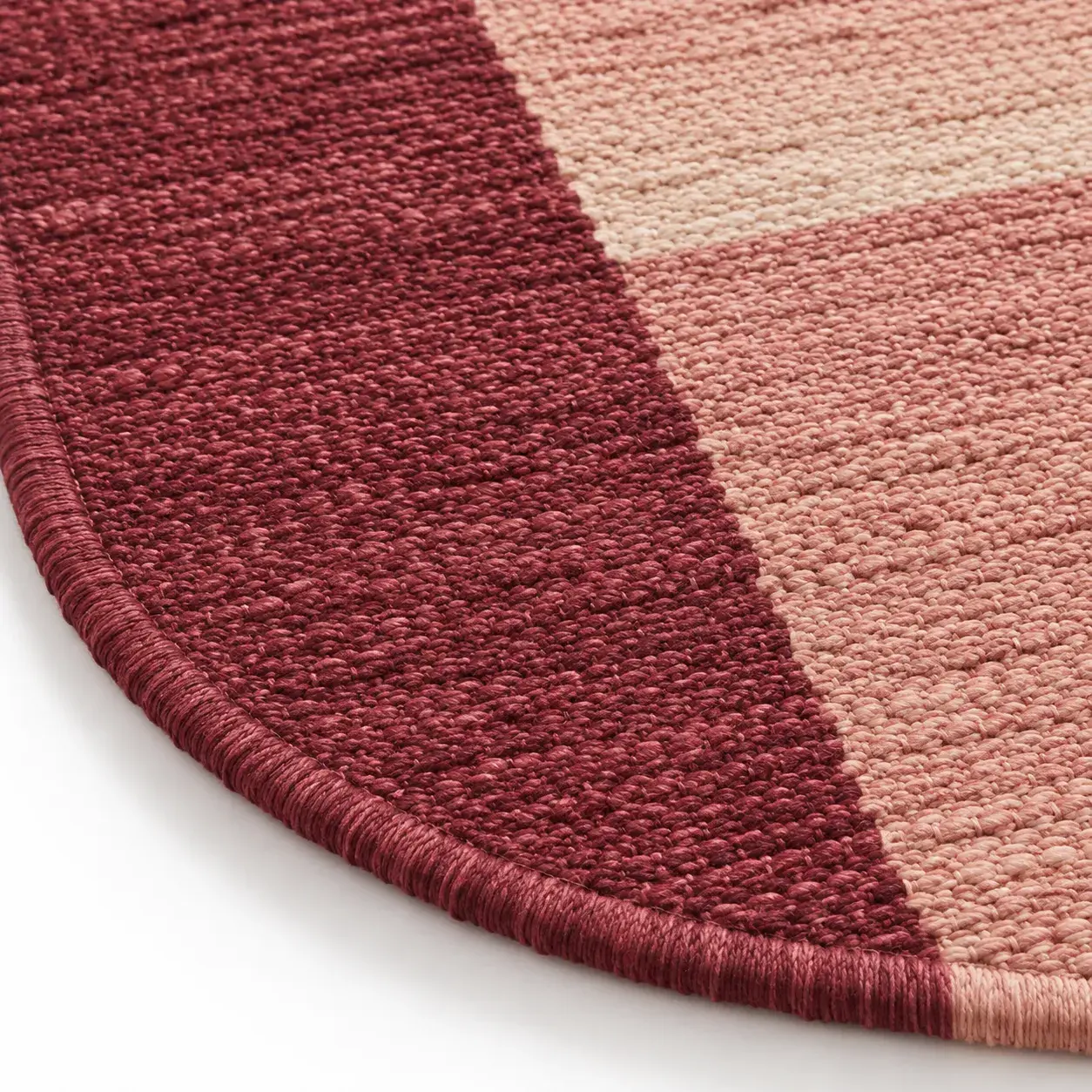 Philippa Rug in pink plum styled in a room, digitally rendered