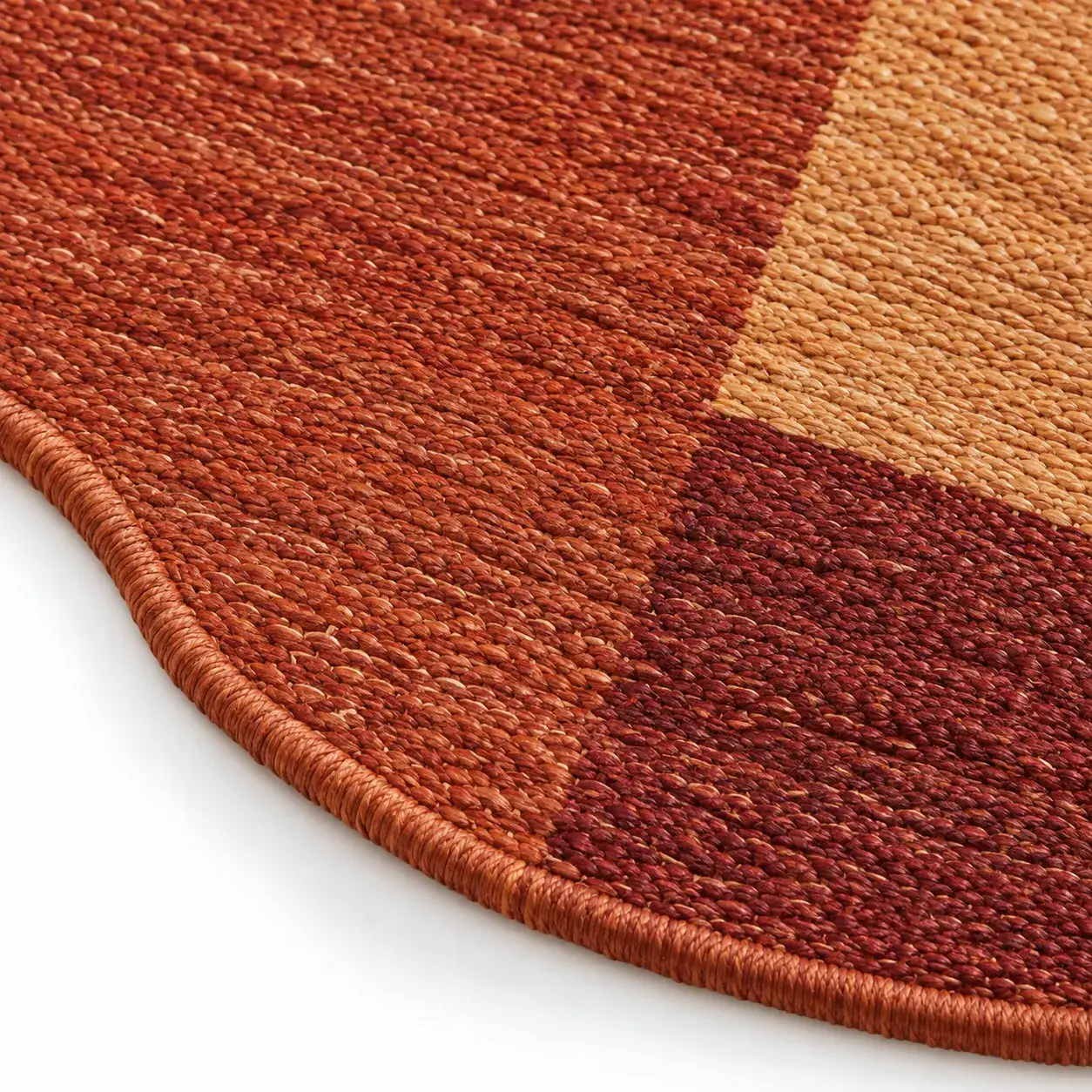 Ptolemy Rug in rust ochre styled in a room, digitally rendered