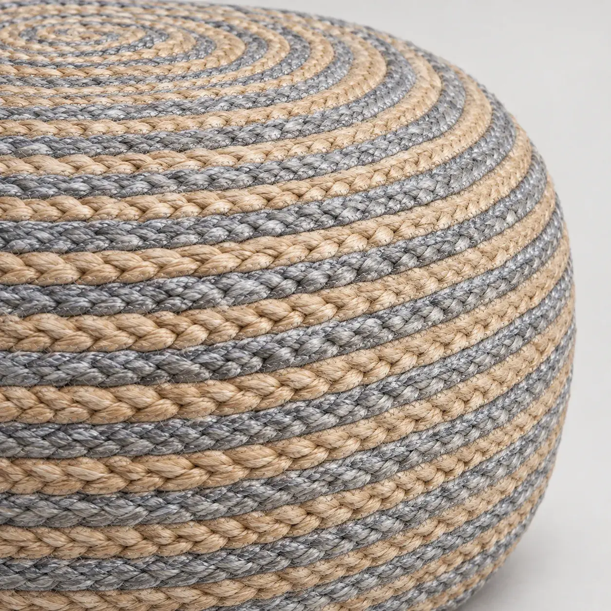 Close view of the Rafa Pouf showing its texture and detail