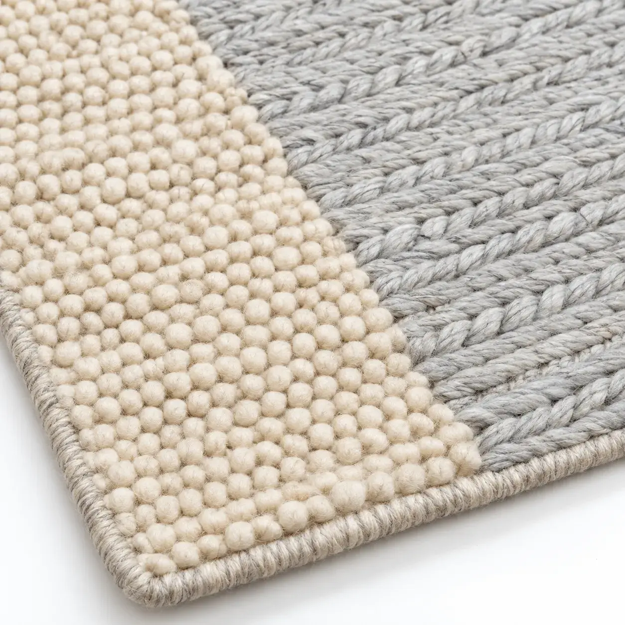 Close view of the Rowan Rug in ivory silver showing its texture and detail