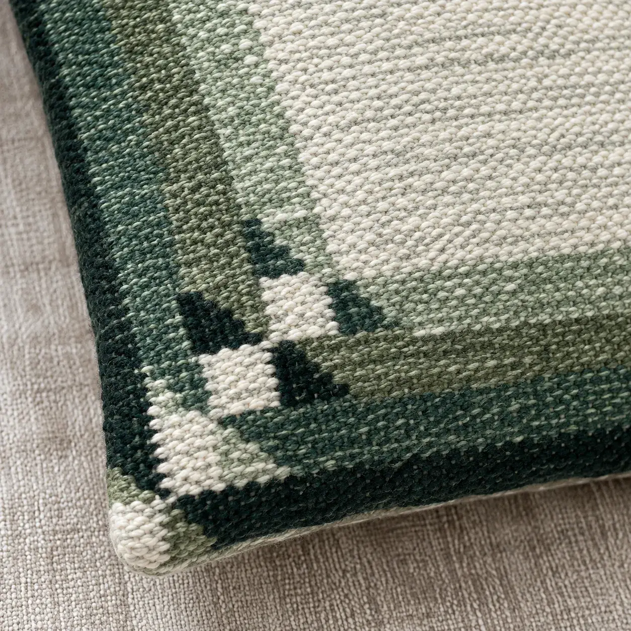 Close view of the Sanna Cushion Cover showing its texture and detail