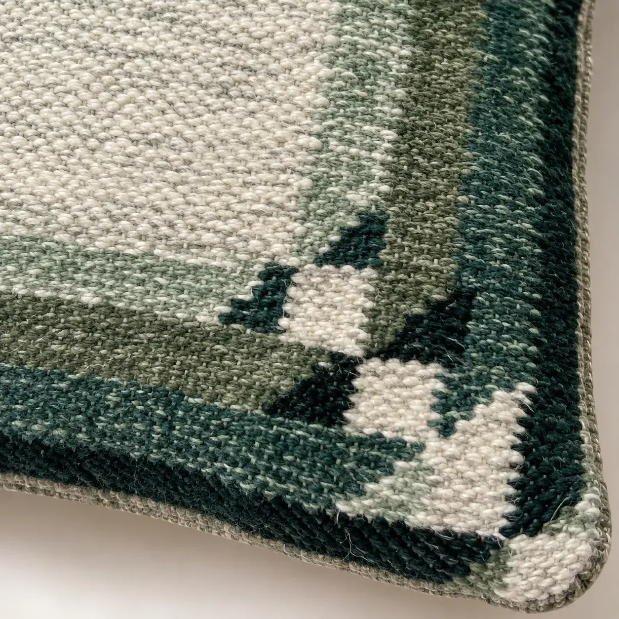 Close view of the Sunniva Cushion Cover showing its texture and detail