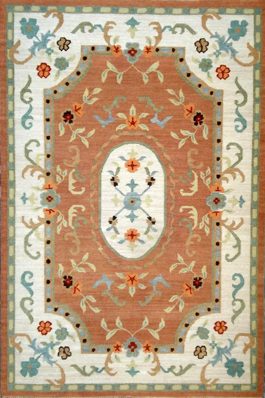 Tessa Rug in terracotta, flatweave floral pattern rug, full view