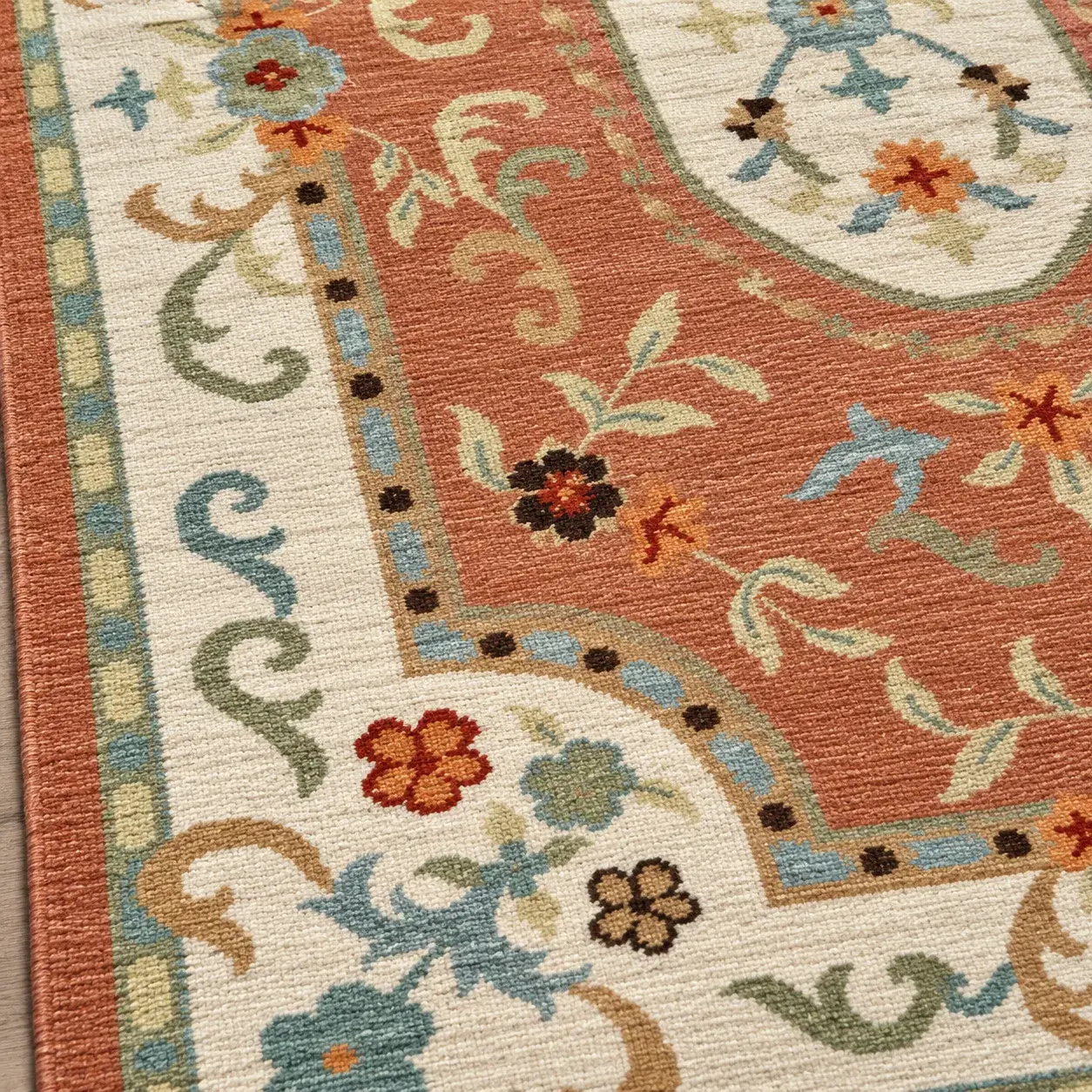 Close view of the Tessa Rug in terracotta showing its texture and detail