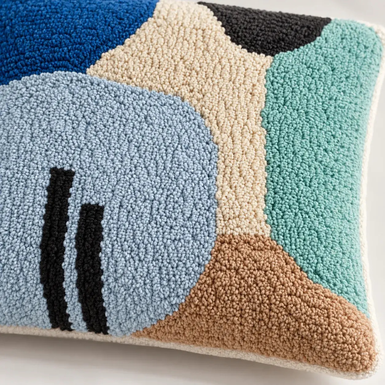 Close view of the Umbriel Cushion Cover showing its texture and detail