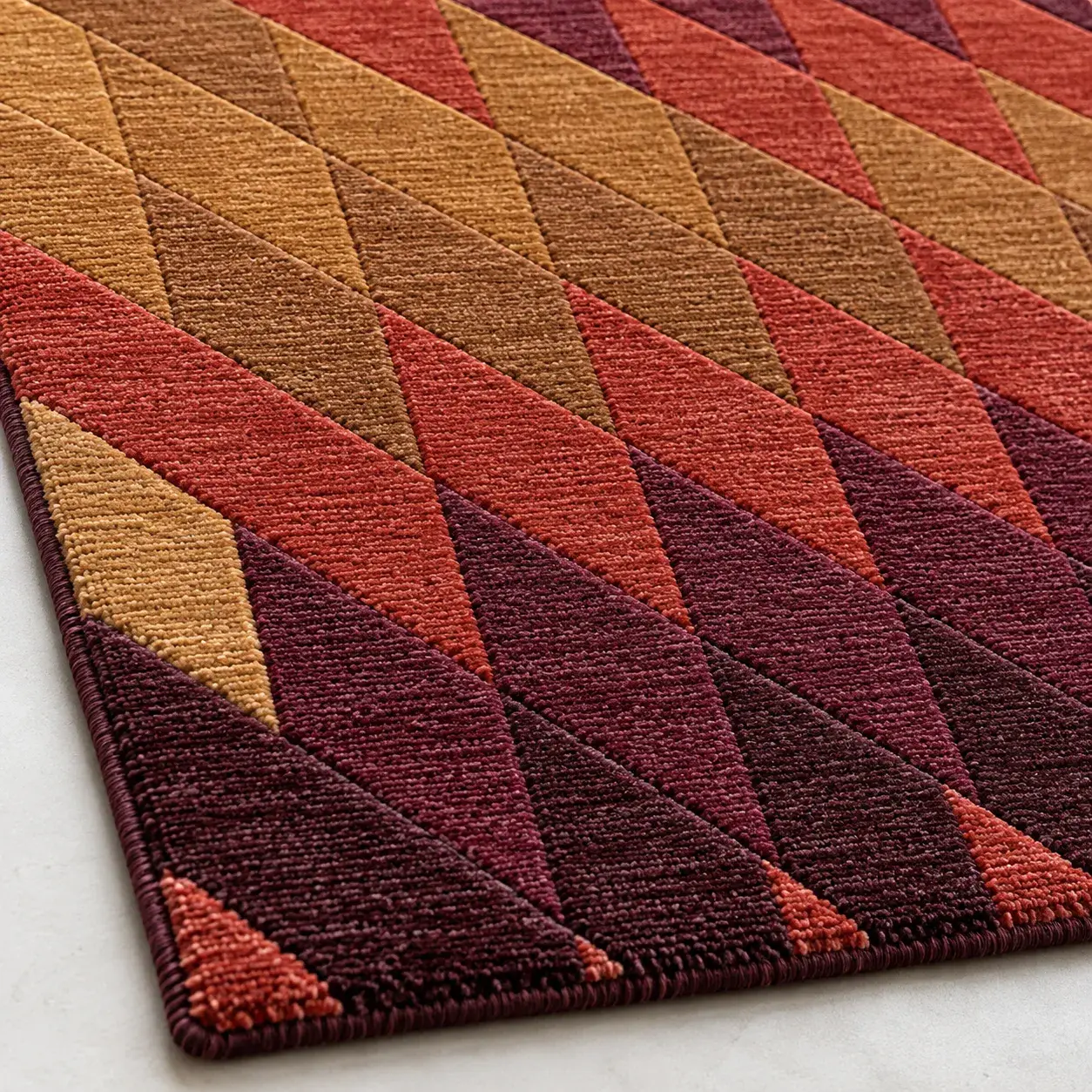 Close view of the Vesper Rug in burgundy showing its texture and detail