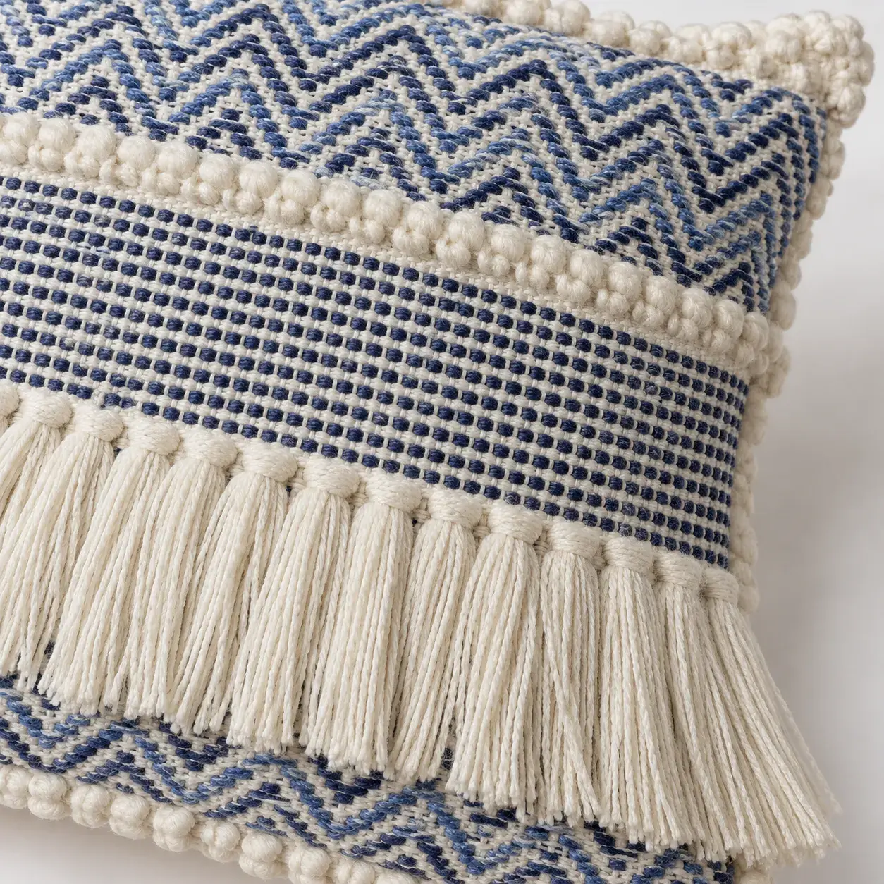Close view of the Zoe Cushion Cover showing its texture and detail