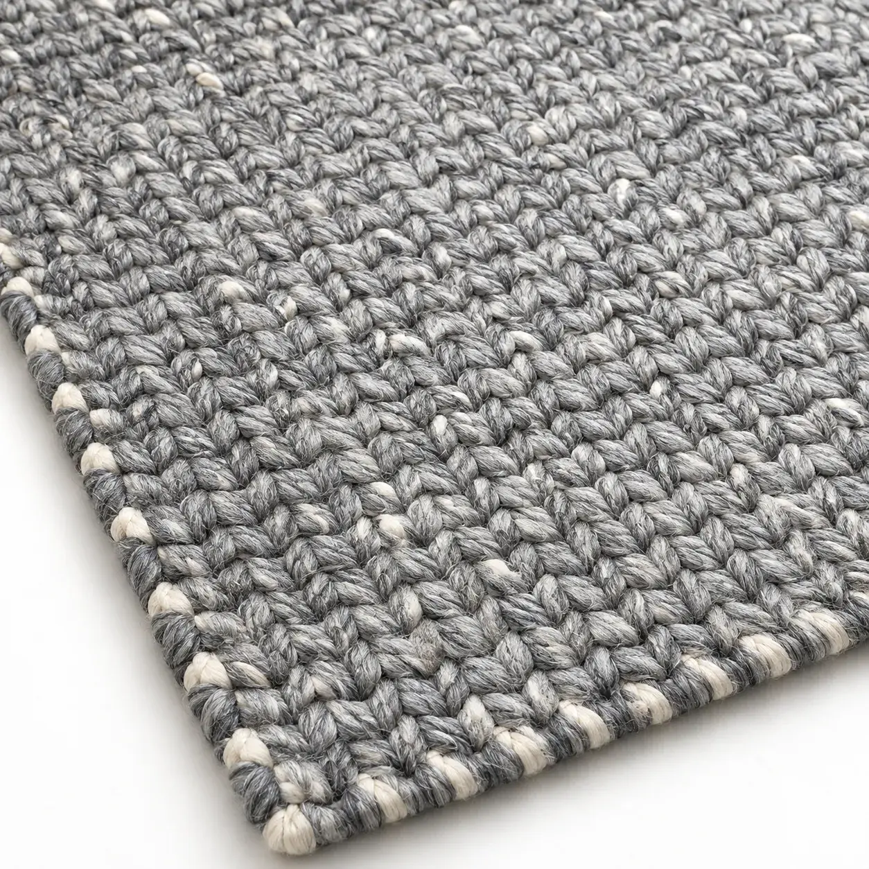 Close view of the Hazel Rug in grey white showing its texture and detail